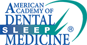 The image shows a logo with text that reads ALABAMA DENTAL SLEEP MEDICINE on top of a stylized graphic resembling a sleep mask, which is placed over a blue background with white and green accents.